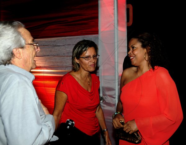 Winston Sill / Freelance Photographer
Heart Foundation of Jamaica  (HFJ) annual Wine and Food Festival, dubbed "Simply red and Wine Festival, held at Jamaica House Lawns on Friday night September 28, 2012. Here are Peter Bangerter (left); Deborah Chen?? (centre); and Yulit Gordon (right), Executive Director,  Jamaica Cancer Society.