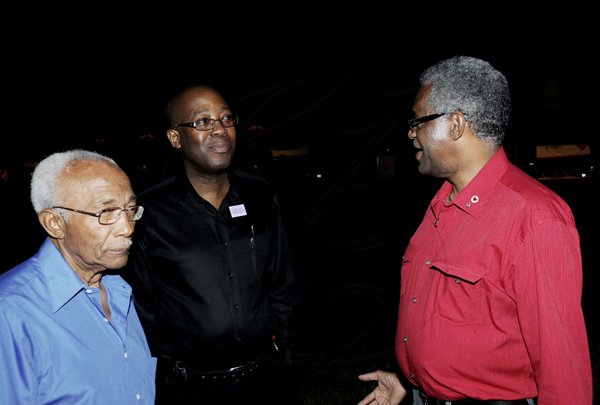 Winston Sill / Freelance Photographer
Heart Foundation of Jamaica  (HFJ) annual Wine and Food Festival, dubbed "Simply red and Wine Festival, held at Jamaica House Lawns on Friday night September 28, 2012. Here are Barry Beckford (left); Hugh Reid (centre); and Maurice Anderson (right).
