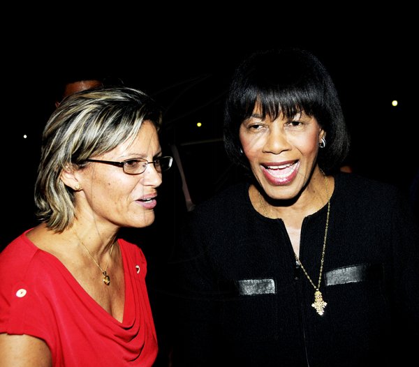 Winston Sill / Freelance Photographer
Heart Foundation of Jamaica  (HFJ) annual Wine and Food Festival, dubbed "Simply red and Wine Festival, held at Jamaica House Lawns on Friday night September 28, 2012. Here are Deborah Chen?? (left), Executive Director, HFJ; and Prime Minister Portia Simpson-Miller (right).
