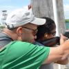 Rudolph Brown/Photographer
Joey Chin giving his daughter Jolie Chin a shooting tip at his target at Bernard Cridland Memorial Sporting Clay Shooting competition at the Jamaica Skeet Club on Sunday, October 27, 2013