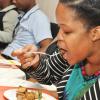 Jermaine Barnaby/Photographer
Jheanelle Hemmings, Allied Insurance Brokers claims associates, takes a bite into the Something Blue Challenge at Caffe Da Vinci on Monday, November 17, 2014.