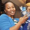 Jermaine Barnaby/Photographer
Shelleha Christie Allied Insurance Brokers claims agent was one of the first guest to win a goodie bag at RW Something Blue Challenge at Caffe Da Vinci on Monday, November 17, 2014.