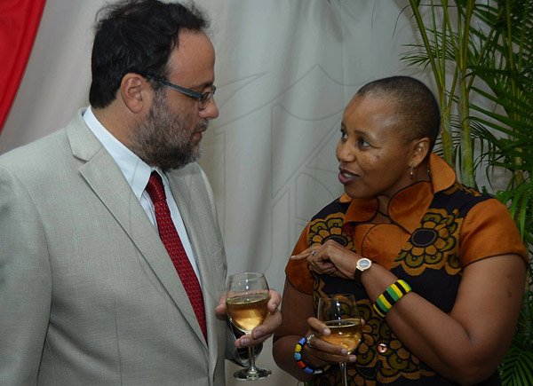 Ian Allen/Photographer
Her Excellency Mathu Joyini right,  High Commissioner of the Republic of South Africa chats with Mark Golding left, Minister of Justice at a Luncheon to Celebrate
 the 19th Anniversary of the Republic of South Africa’s Freedom Day. The luncheon was held at Terra Nova Hotel in Kingston on Friday.