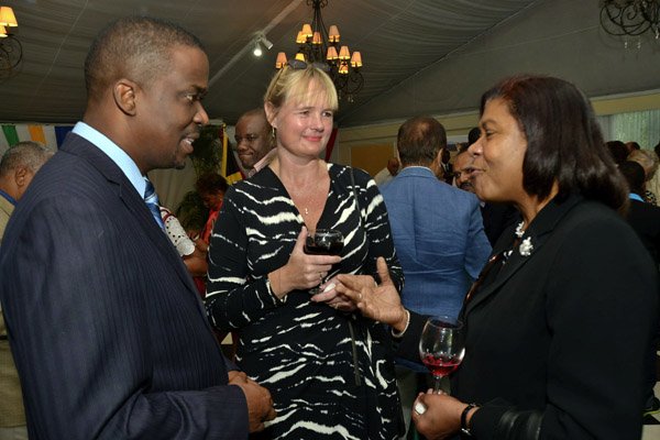 Ian Allen/Photographer
Zaila McCalla right, Chief Justice chats with Reverend Devon Dick left and Helene Hagen-Larsen centre, Wife of the Argentinian Ambassador during a luncheon to celebrate the 19th Anniversary of the Republic of South Africa’s Freedom Day. The luncheon was held at the Terra Nova Hotel in Kingston on Friday.