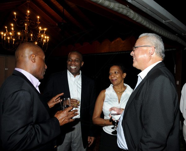Winston Sill / Freelance Photographer
Spanish Ambassador Celsa Nuno host Dinner and Pinno Recital  with David Gomez, held at Norbrook Road, St. Andrew on Saturday night February 23, 2013. Here are Aubyn Hill (left); Greg Christie (second left); Jan Christie (second right); and Delroy Chuck (right).