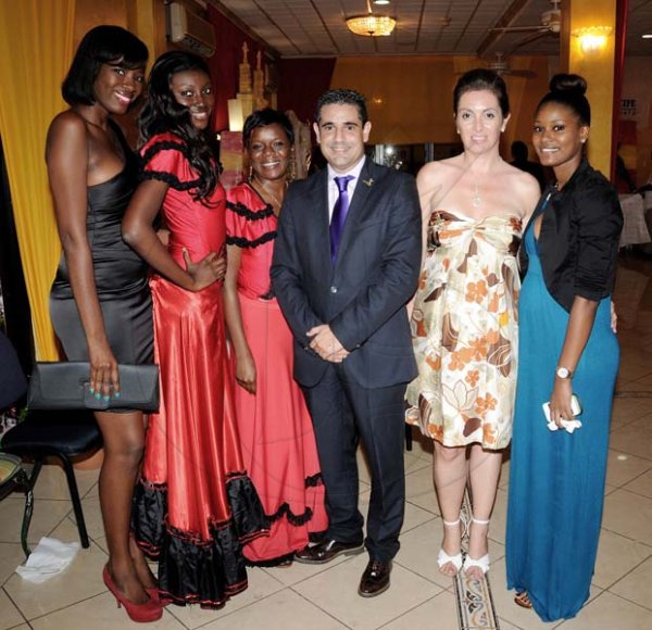 Winston Sill/Freelance Photographer
SpanishAmbassador Celsa Nuno host Spain National Day Reception, held at Mona Visitors' Lodge, UWI, Mona Campus on Wednesday night October 9, 2013. Here are Sadeera Shaw (left); Candy Carty (2nd left); Donique Robinson-Lewis (3rd left); Ricardo Esteban (centre); Helena Gomez Ojeda (2nd right); and Vanesa Bryan (right).