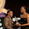 Winston Sill / Freelance Photographer
Runner-up to the Sportsman of the Year Yohan Blake (left) receives his trophy from RJR Sports Foundation board member Grace Jackson at the RJR National Sportsman and Sportswoman Award Ceremony, at the Pegasus Hotel on Friday.