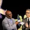 Winston Sill / Freelance Photographer
Glen Mills (left) receives the Sagicor Iconic Award from president and CEO of Sagicor, Richard Byles at Friday night's RJR National Sportsman and Sportswoman Award Ceremony, held at the Jamaica Pegasus Hotel.