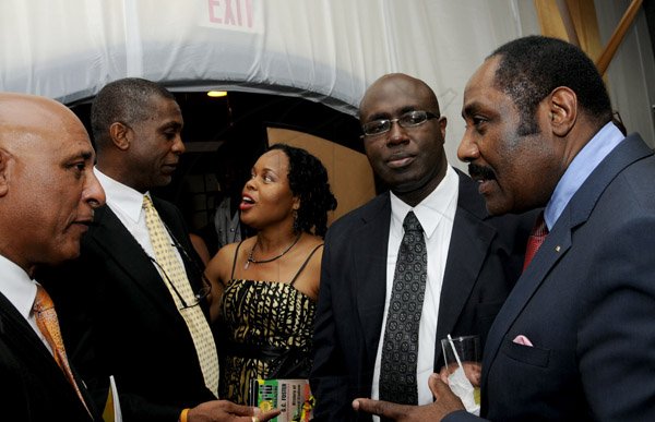 Winston Sill / Freelance Photographer
RJR National Sportsman and Sportswoman Awards Ceremony, held at the Jamaica Pegasus Hotel, New Kingston on Friday night January 11, 2013. Here are Al Hamilton (left); Michael Holding (second left); Trudy Williams (centre); Gary Allen (second right); and Capt. Horace Burrell (right).