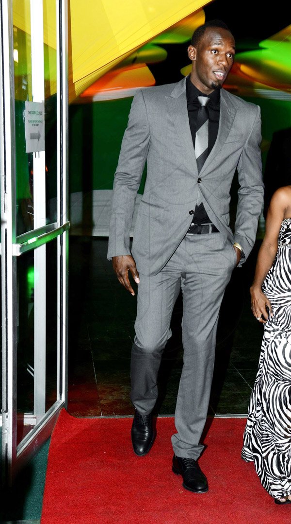 Winston Sill/Freelance Photographer
Photos of Shelly-Ann Fraser-Pryce and Usain Bolt at RJR National Sportsman and Sportswoman of the Year Awards for 2013 Ceremony, held at the Jamaica Pegasus Hotel, New Kingston on Friday night January 10, 2014.