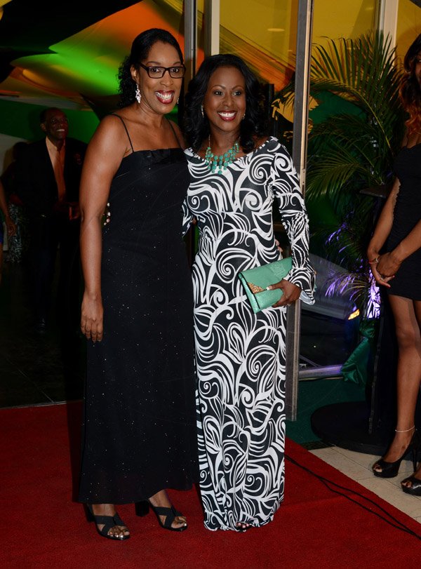 Winston Sill/Freelance Photographer
The 53rd  RJR National Sportsman and Sportswoman of the Year 2013  Awards Ceremony, held at the Jamaica Pegasus Hotel, New Kingston on Friday night January 10, 2014. Here are Suzette Shaw-Reid (left); and -----????? (right).