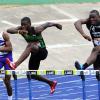 Ian Allen/Photographer
Michael Ohara of Calabar ahead of Obrien Waysome of Jamaica College right and Shaquille Shaw left of Kingston College at the first hurdle in the Class 2 Boys 110 at the Boys and Girls Atlethics Championships on Day Four.
