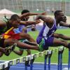 Ian Allen/Photographer
Omar McLeod right of Kingston College ahead of Kemar Williams of Calabar and Twaine Gordon of St.Jago in the semi-finals of the class 1 boys 110 metre hurdles on Day Four of the 2013 Boys and Girls Atlethics Championships.