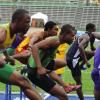 Ian Allen/Photographer
Omar McLeod right of Kingston College ahead of Kemar Williams of Calabar and Twaine Gordon of St.Jago in the semi-finals of the class 1 boys 110 metre hurdles on Day Four of the 2013 Boys and Girls Atlethics Championships.