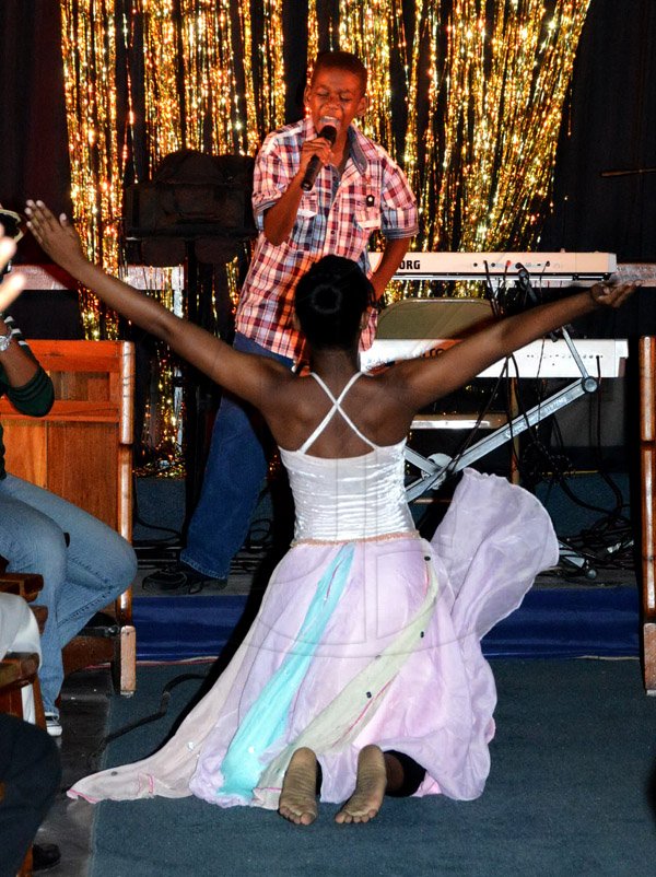 Winston Sill/Freelance Photographer
St. Luke's Anglician Church host Reggae, Jazz and Blues  Go Gospel Concert, held at St. Luke's Church, Slipe Road on Sunday night May 18, 2014. Here is Javier White and dancer.