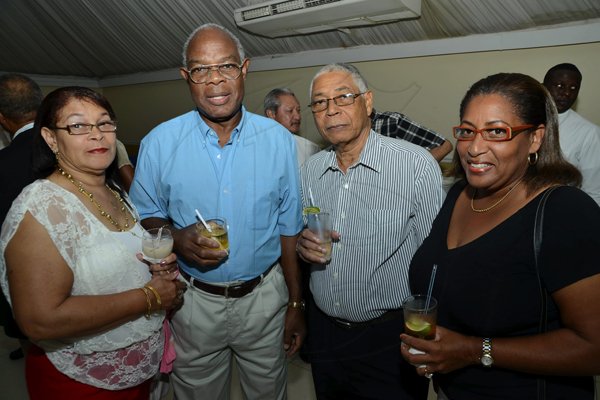 Rudolph Brown/Photographer
From left Grethel Tapper Thomas, Vincent Thomas, Wendell Goodin and Angela Goodin at the Sterling Asset Management Investor Briefing at the Terra Nova Hotel in Kingston on Thursday, September 27-2012