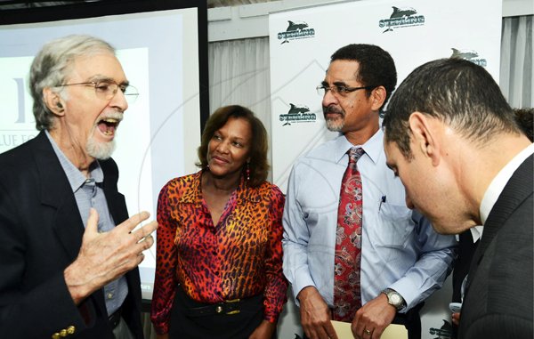 BUSINESS

Rudolph Brown/Photographer
Donald Duff makes his point with gusto to, from second left, Sterling Asset's Caludette Meghoo and Charles Ross, and Blue Equity chairman Jonathan Blue, at the Sterling Asset Management investor briefing held at the Terra Nova hotel in Kingston on Thursday, September 27, 2012.
