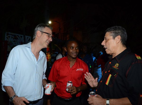 Winston Sill/Freelance Photographer
Summerfest Productions Limited host Reggae Sumfest 2014  Launch, held at Countryside Club, Courtney Walsh Drive on Tuesday night June 10, 2014. Here are Bruce Kidner (left), Financial Director, Red Stripe; Kamal Powell (centre), of  Red Stripe; and Ronnie Gourzong (right), of  Sumfest.