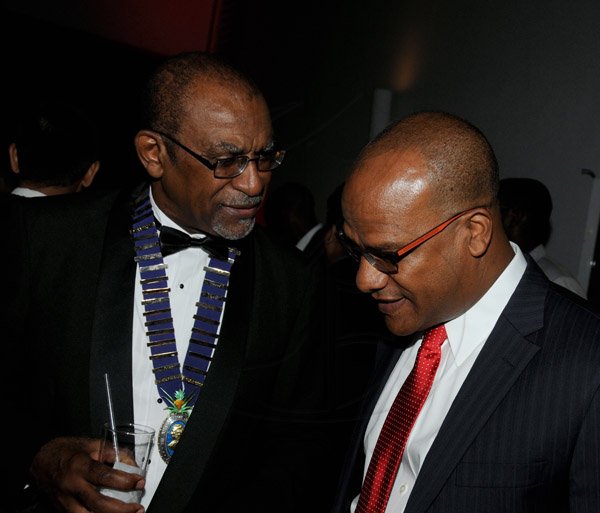 Winston Sill/Freelance Photographer
The Association of Surgeons in Jamaica (ASJ) Annual Awards Banquet, held at the Jamaica Pegasus Hotel, New Kingston on Saturday night May 18, 2013. Here are Dr. Cecil Batchelor (left), President, ASJ; and Minister of National Security.
