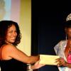 Winston Sill/Freelance Photographer
Miss Jamaica Caribbean Talented Teen 2013 show and coronation, held at Louise Bennett Garden Theatre, Hope Road on Sunday night September 1, 2013. Here Diane Wilson (left), Recruitment and Enrollment Manager of University College of the Caribbean presents a scholarship to the winner Josselle Fisher (right).