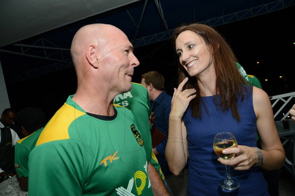 Rudolph Brown/ Photographer
Paul Nixon, Coach of the Jamaica Tallawahs greets Melanie Subratie, Director of Facey Commodity.at a welcome reception on Wednesday night hosted by XOX for members of the Jamaica Tallawahs cricket team at the Pegasus Hotel.