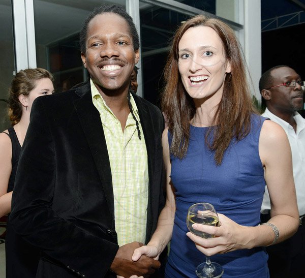 Rudolph Brown/ Photographer
Melanie Subratie welcomes Damion Crawford, Minister of State in the Ministry of Tourism and Entertainment at a welcome reception on Wednesday night hosted by XOX for members of the Jamaica Tallawahs cricket team at the Pegasus Hotel.