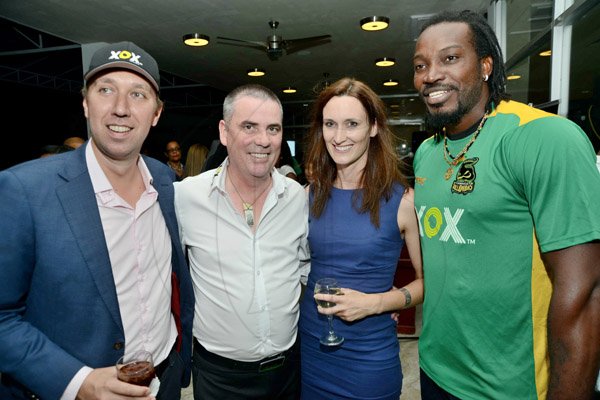 Rudolph Brown/ Photographer
From left are Rob van den Blink, co-founder of XOX Mobile, Locky Mulholland, Co-founder and Managing Director of XOX brand, Melanie Subratie, Director of Facey Commodity and Chris Gayle, international cricketer at a welcome reception on Wednesday night hosted by XOX for members of the Jamaica Tallawahs cricket team at the Pegasus Hotel.