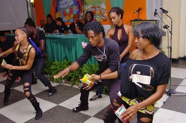 Rudolph Brown/Photographer
Black Eagle Tang dancing at the Tang Outreach press conference to launch the Tang Fortune Fountain at the Terra Nova Hotel in Kingston on Tuesday, August 28-2012