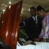 Ian Allen/Photographer
Lisa Aris and Karl Aris look on at Howard Aris during his funeral service at the Indoor Arena.