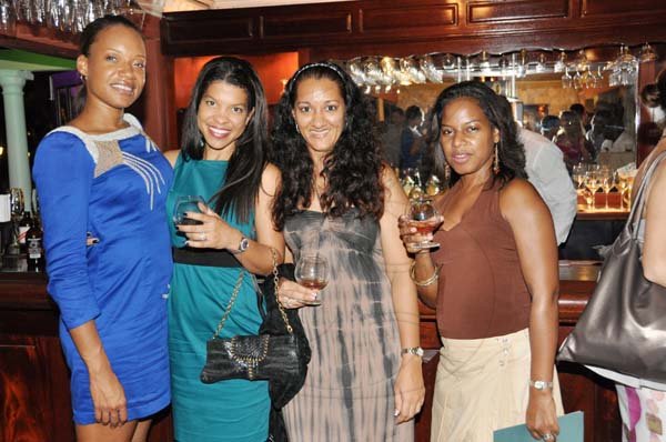 Janet Silvera Photo
 
From Left: J. Wray and Nephew's Raihn Sibblies, Tanisa Samuel, Bridgette Pouyat and Bin 26's Kerri-Anne Reckord pose for the cameras.

*************************************************************at Half Moon Sugar Mill restaurant's 'Exploration of Aisan Influences in Caribbean Cuisine' Wednesday night in Montego Bay.