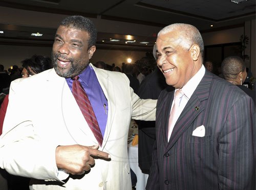 Ricardo Makyn/Staff Photographer
Town Clerk Errol Green with the Hon Robert Pickersgill Minister of Water,Land,Environment and Climate Change  at the   32nd Annual National Leadership Prayer Breakfast at the Jamaica Pegasus Hotel on Thursday 19.1.2012