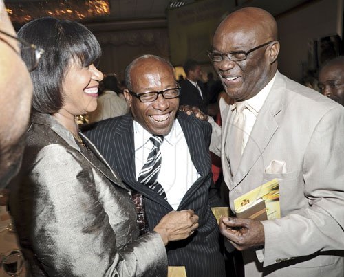 Ricardo Makyn/Staff Photographer
 Prime Minister the Most  Hon Portia Simpson Miller with Dr Wellesley Blair Pastor of  the Portmore New Testament Church of God and Herro Bliar Political Ombudsman  32nd Annual National Leadership Prayer Breakfast at the Jamaica Pegasus Hotel on Thursday 19.1.2012