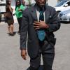 Jermaine Barnaby/Freelance Photographer
Everald Warmington making his way into the Bitu compound just before the state opening of Parliament at Gordon House on Thursday April 14, 2016.