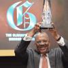 Jermaine Barnaby/Photographer
Dr. Peter Phillips hold aloft the Gleaner Honour awards for man of the year held at the Pegasus hotel on Monday January 25, 2016.