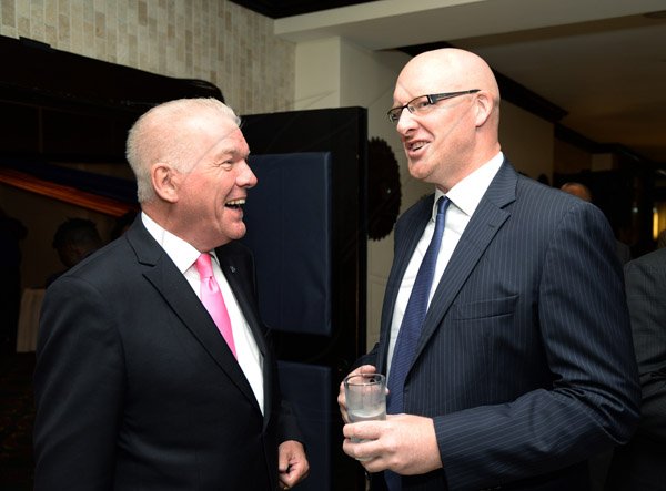Jermaine Barnaby/Photographer
David Butler (right) CEO Digicel talks with  Peter Hilary, General Manager of the Jamaica Pegasus at the Gleaner Honour awards held at the Pegasus hotel on Monday January 25, 2016.