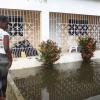 Anthony Minott/Freelance Photographer
Mickayla Laing looks at a neighbour's flooded yard in Old Braeton after the passage of Hurricane Sandy in Portmore, St Catherine last Thursday.