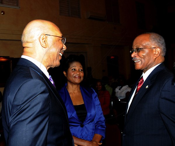 Winston Sill / Freelance Photographer
The University College of the Caribbean (UCC) function  to launch the UCC Foundation and launch of Sir Kenneth Hall's Book, held at King's House on Tuesday April 17, 2012. Here rae Governor General Sir Patrick Allen (left); Lady Patricia Allen (centre); and Sir Kenneth Hall (right).