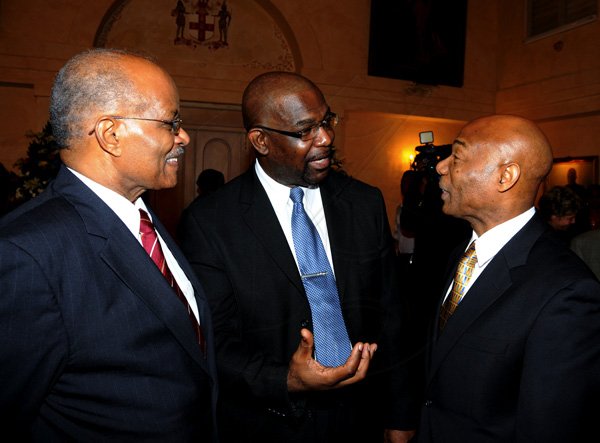 Winston Sill / Freelance Photographer
The University College of the Caribbean (UCC) function  to launch the UCC Foundation and launch of Sir Kenneth Hall's Book, held at King's House on Tuesday April 17, 2012. Here are Sir Kenneth Hall (left); Winston Adams (centre), UCC Chairman and President; and guest speaker Gene Leon (right), IMF Senior Resident Representative to Jamaica.