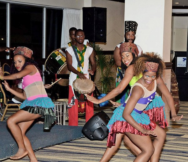 Winston Sill/Freelance Photographer
Dancers and drummers from the L'Acadco-A United Caribbean Dance Force performs an original piece titled 'Passion Fruit'