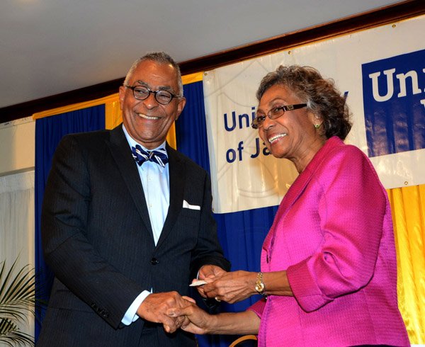Winston Sill/Freelance Photographer
United Way of Jamaica annual Nation Builders'  Awards and  Employee Awards Ceremony, Held at the Jamaica Pegasus Hotel, New Kingston on Thursday September 11, 2014. Here are Dr. Michael Banbury (left); and Lady Rheima Hall (right).