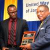 Winston Sill/Freelance Photographer
United Way of Jamaica annual Nation Builders'  Awards and  Employee Awards Ceremony, Held at the Jamaica Pegasus Hotel, New Kingston on Thursday September 11, 2014. Here are Marcus Steele (left), Managing Director, Carreras Limited accepting the Award for the Highest Corporate Donor, from Minister Anthony Hylton (right).