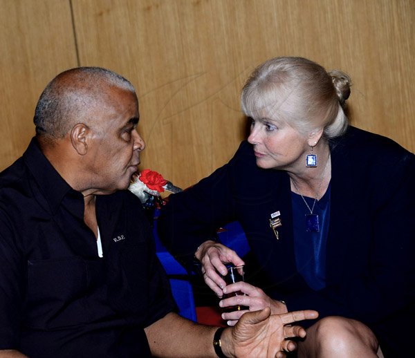 Winston Sill/Freelance Photographer
Robert Pickersgill in what appears to be intriguing conversation with Denise Herbol at The United States of America Embassy host 238th  Anniversary  of Independence Reception.