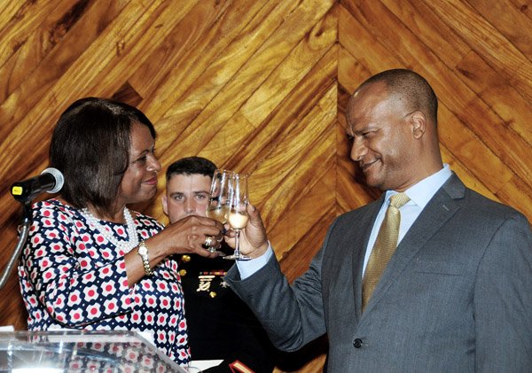 Winston Sill/Freelance Photographer
United States Ambassador Pamela Bridgewater and Minister of National Security Peter Bunting, raise their glasses in toasting the United States at its 4th of July celebration last week.


........................................................................ host America Independence Day Reception, held at Bank of Jamaica,  Downtown, Kingston on Thursday July 4, 2013.