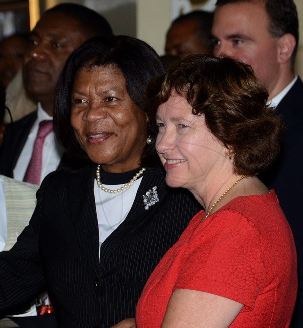 Winston Sill/Freelance Photographer
USAID/Jamaica host Appreciation Reception for their various partners and the private sector, for over 52 years, held at the Knutsford Court Hotel, Ruthven Road on Tuesday night December 9, 2014. Here are  Chief Justice Zaila McCalla (left); and Elizabeth Martinez (right), Charge d' Affaires, US Embassy.