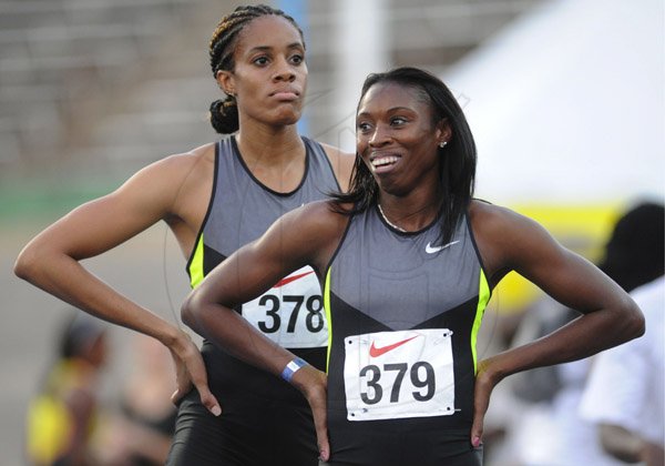 Ricardo Makyn/Staff Photographer 
Left Kaliese Spencer and Sherika Williams after finishing the  Women's 200 Meter   at the Utech Classic's held at the National stadium on Saturday 13.4.2013