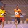 Ricardo Makyn/Staff Photographer.
Odean Skeen of Wolmers beating Andre Wellington and Barnes   at the Utech Classics held at the National Stadium on Saturday 15.4.2012