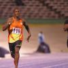 Ricardo Makyn/Staff Photographer.
Ricardo Chambers winning the His heat in the Mens 200  Meter while Dwayne Chambers finishes behind   at the Utech Classics held at the National Stadium on Saturday 15.4.2012
