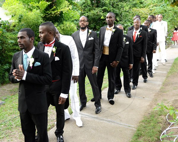 Winston Sill/Freelance Photographer
Grooms wait anxiously on their bride to come out and meet them.