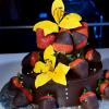 Winston Sill/Freelance Photographer

Gorgeous cake with chocolate covered strawberries by Sarah Michelle Desserts.