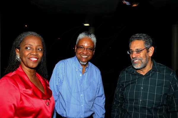 Winston Sill / Freelance Photographer
UWI Vice Chancellor Prof. Nigel Harris host Christmas Party, held at Long Mountain Road, UWI, Mona on Thursday night December 8, 2011.Here are Dr. Marceline Collins-Figueroa (left); Prof. Harris (centre); and Dr. Peter Figueroa (right).